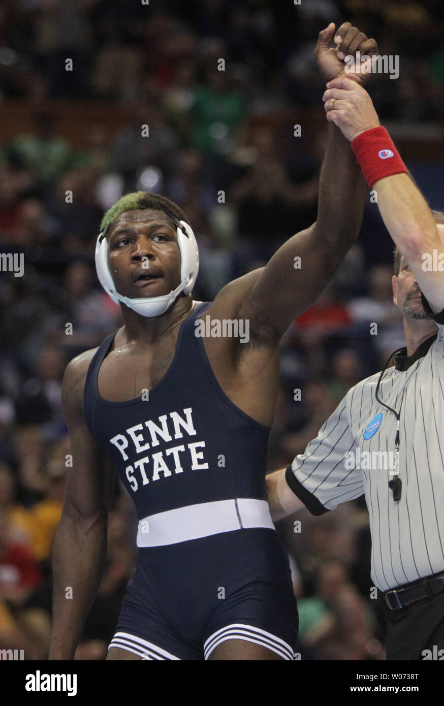 Edward Ruth of Penn State University is declared the winner after beating Nick Amuchasteg of Stanford in their 174 pound weight class match in the 2012 NCAA Division 1 Wrestling Championships at the Scottrade Center in St. Louis on March 17, 2012. UPI/Bill Greenblatt Stock Photo