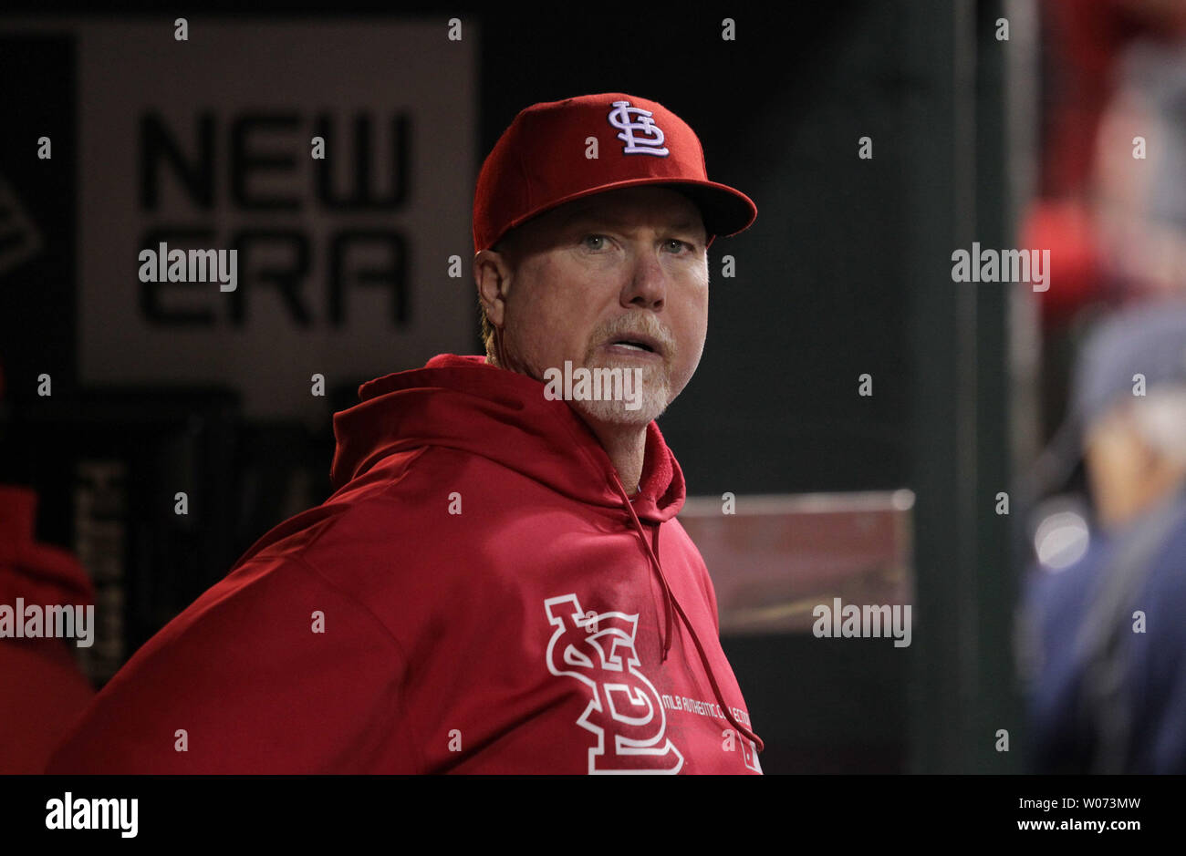St. Louis Cardinals hitting coach Mark McGwire watches the action