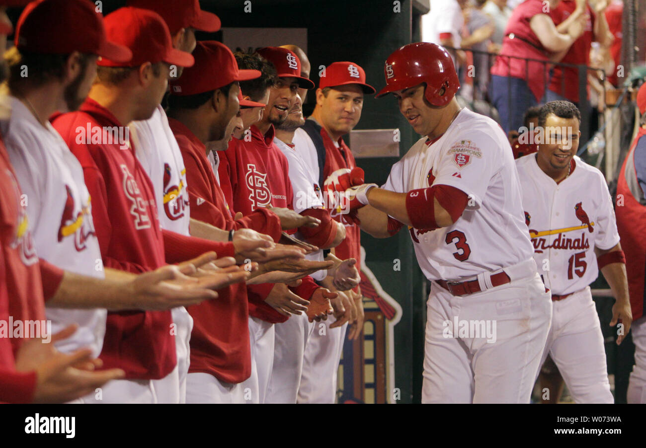 St. Louis Cardinals Jon Jay (L) and Carlos Beltran celebrate in