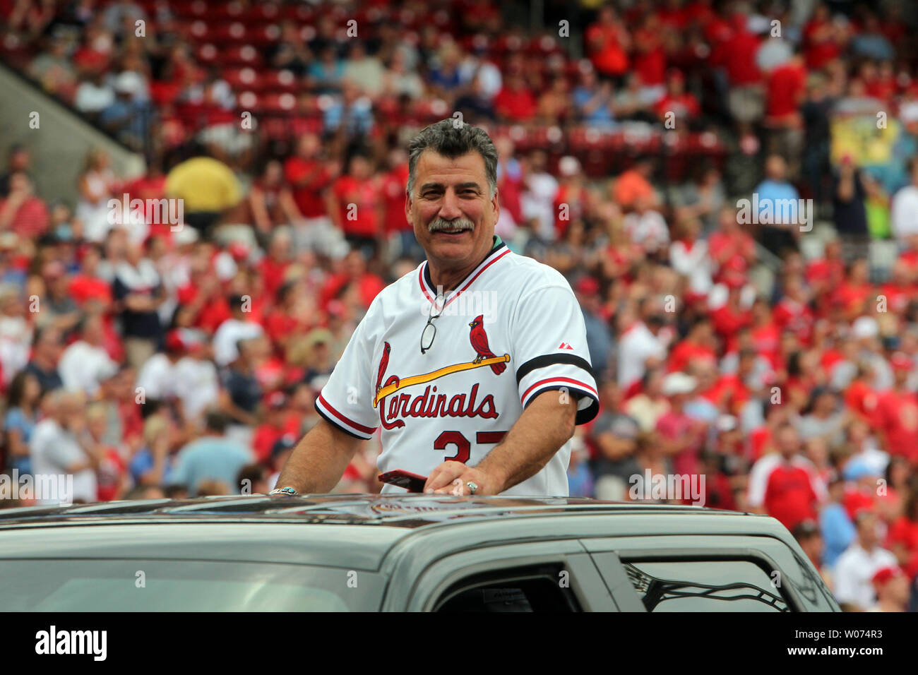 Keith Hernandez, a member of the 1982 St. Louis Cardinals World Series  Championship team, rides in a convertable as he is introuduced at Busch  Stadium in St. Louis on August 4, 2012.