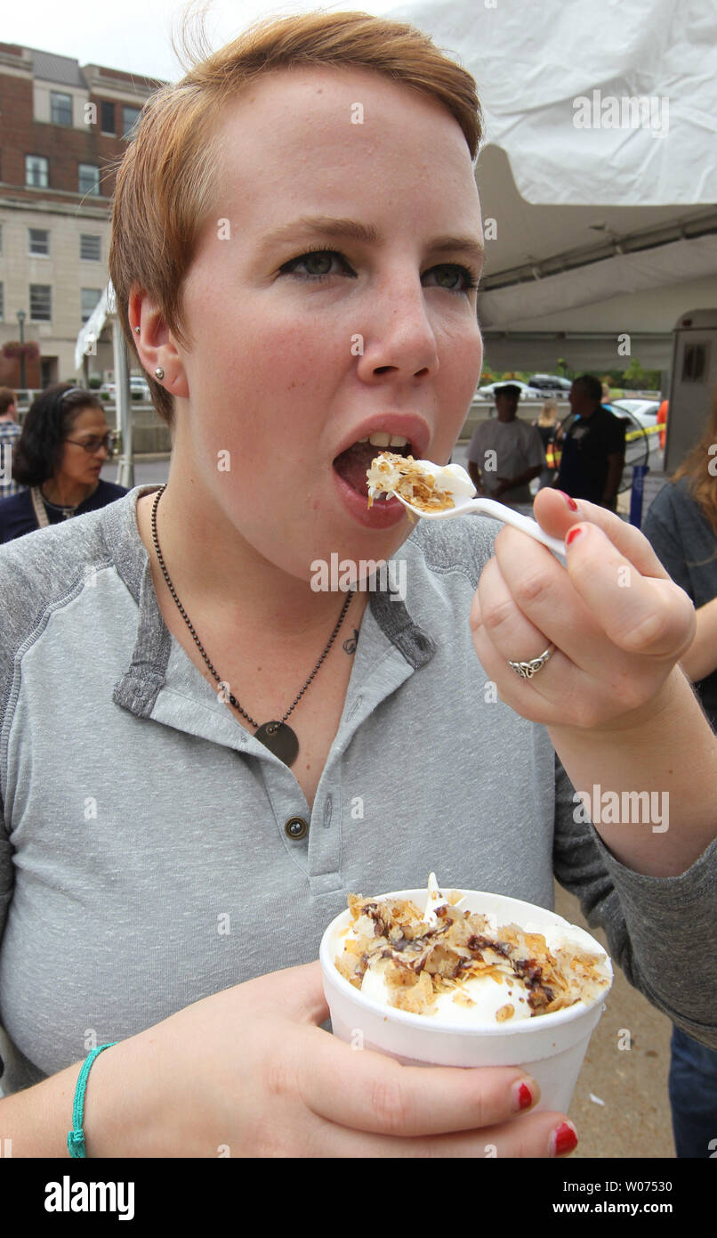 Visitor Alexa Dirnbeck enjoys a Baklava sundae during the St. Nicholas