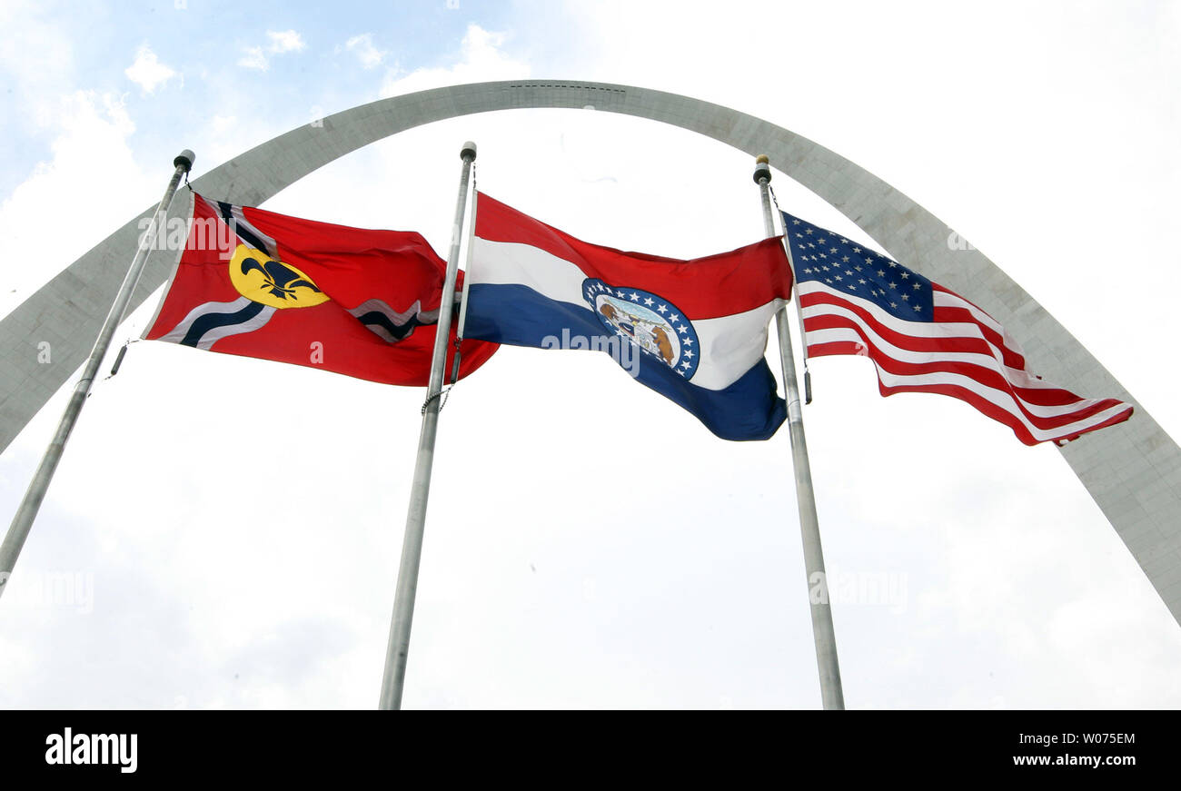 The City of St. Louis, State of Missouri and American flags fly in the ...
