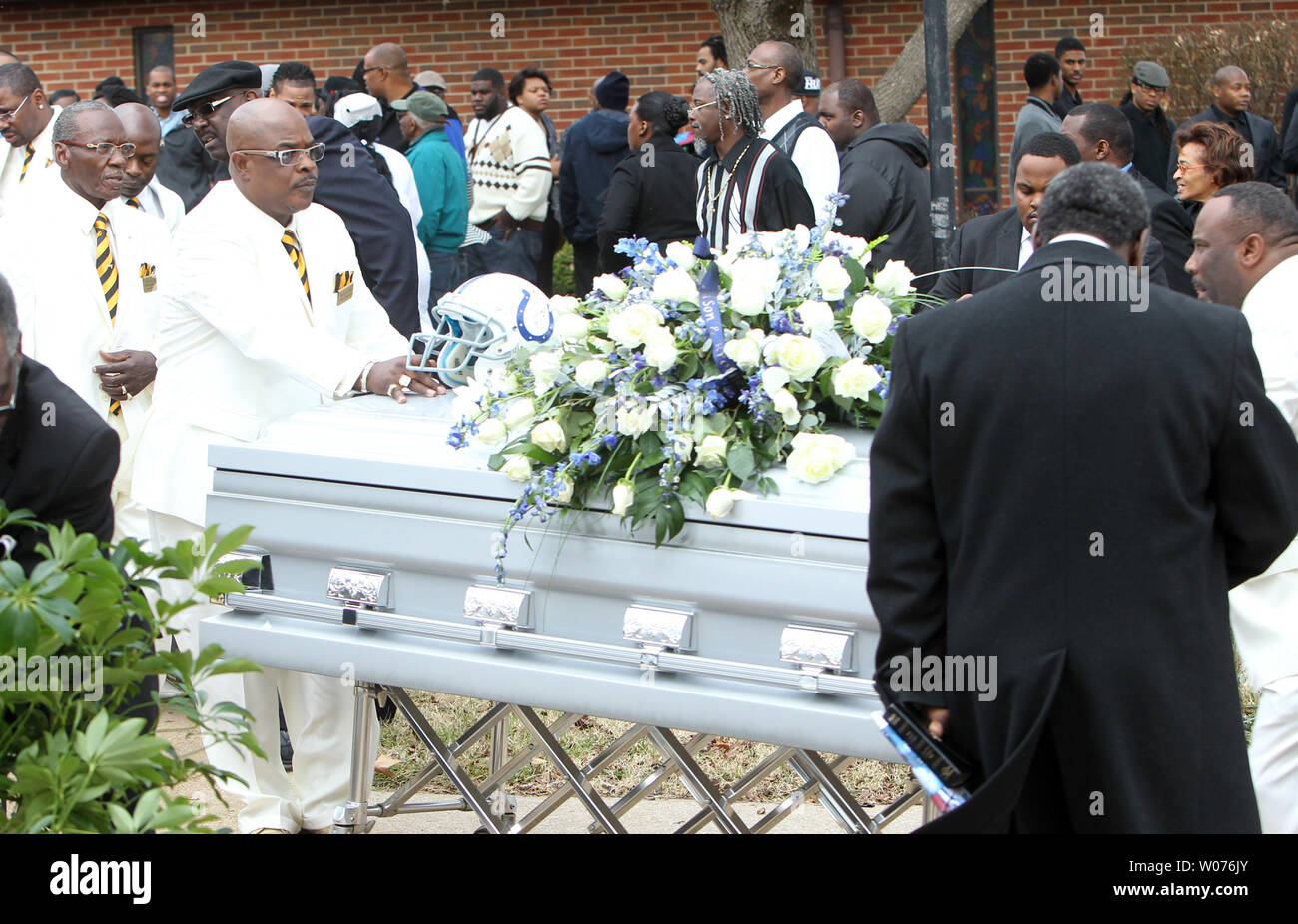 Officials wheel the casket of Jerry Brown, Jr. to a waiting hearse during his funeral at the Hopewell Missionary Baptist Church in St. Louis on December 15, 2012. The Dallas CowboysÕ practice squad nose tackle was killed in an Irving car accident on December 8, 2012 when his best friend and teammate Josh Brent hit a curb, flipping the vehicle.    UPI/Bill Greenblatt Stock Photo