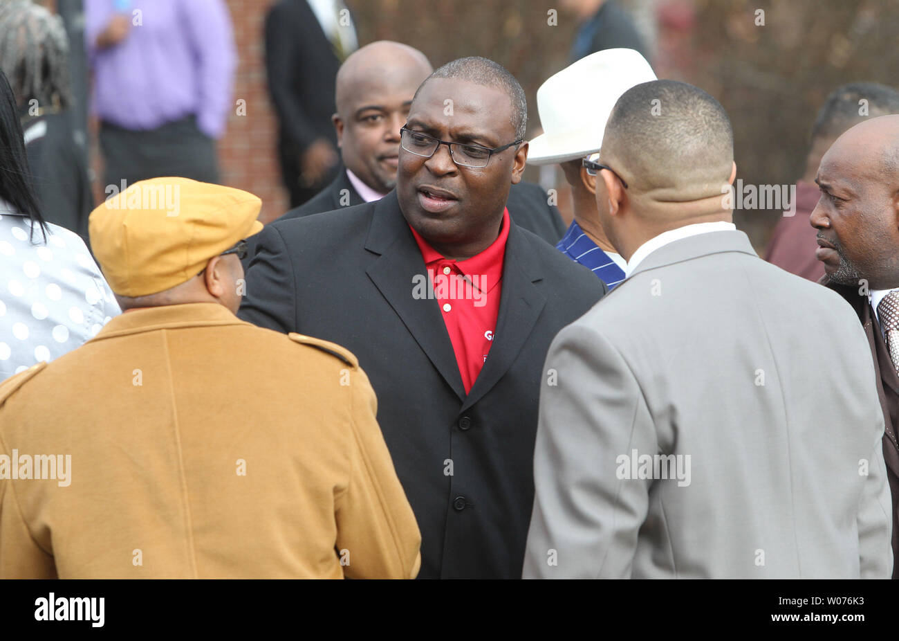 Former NFL defensive back Demetrious Johnson talks with mourners following the funeral of Jerry Brown, at the Hopewell Missionary Baptist Church in St. Louis on December 15, 2012. The Dallas CowboysÕ practice squad nose tackle was killed in an Irving car accident on December 8, 2012 when his best friend and teammate Josh Brent hit a curb, flipping the vehicle.    UPI/Bill Greenblatt Stock Photo