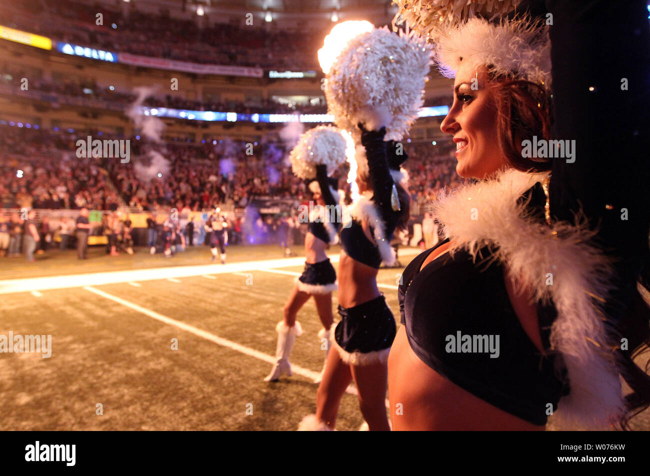 St. Louis Rams cheerleaders cheer as the team is introduced before a game against the Minnesota Vikings at the Edward Jones Dome in St. Louis on December 16, 2012.   UPI/Bill Greenblatt Stock Photo