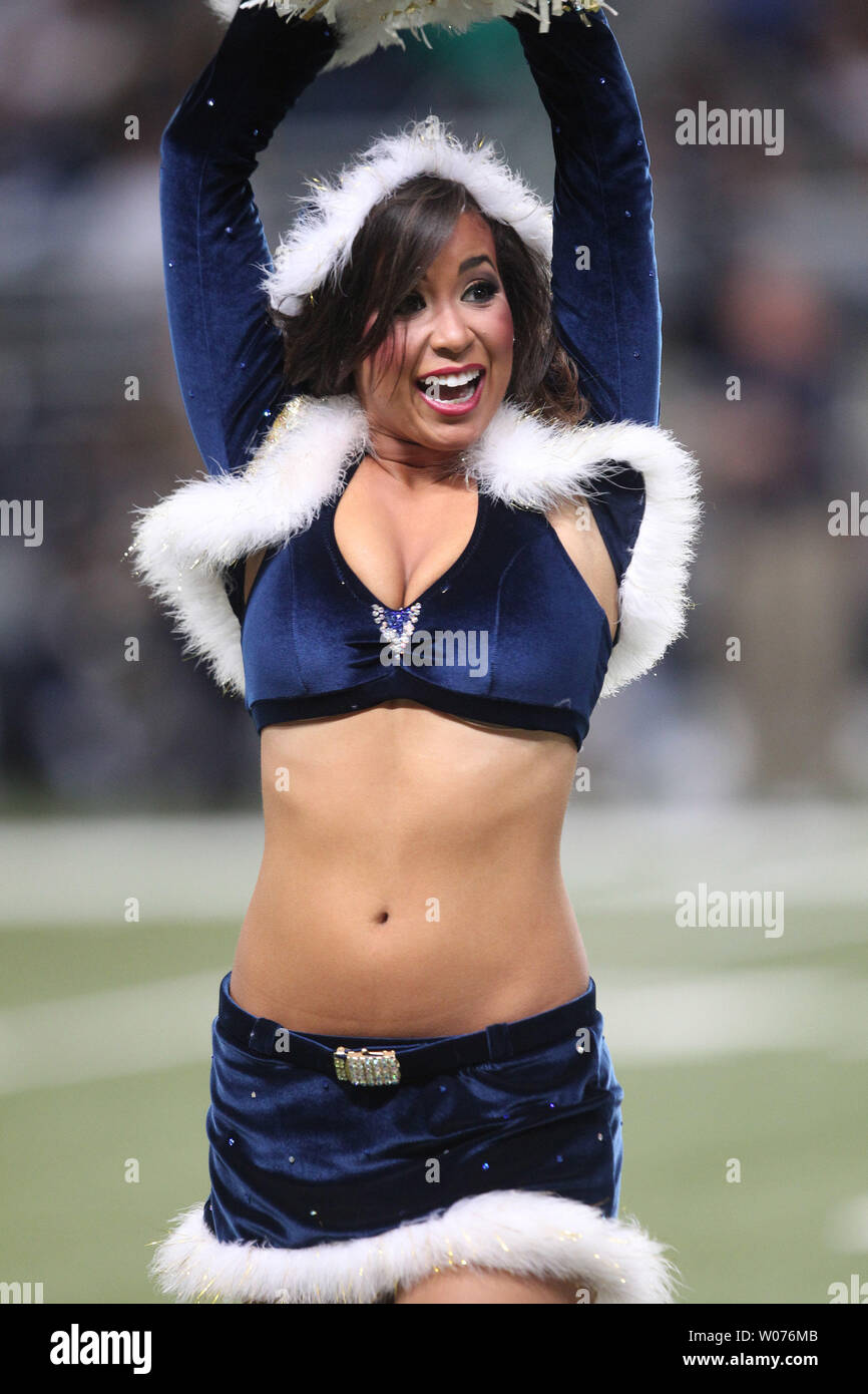 A St. Louis Rams cheerleader entertains the crowds during the Kansas City  Chiefs- St. Louis Rams football game in a Christmas outfit at the Edward  Jones Dome in St. Louis on December