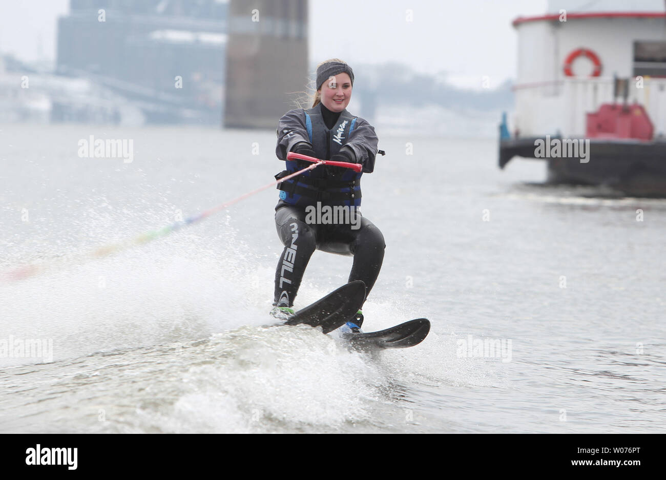 Skier Mallory Diederich negotiates a wake while water skiing on the Mississippi River in St. Louis on January 1, 2013. Several skiers continued a 27 year tradition of skiing on the Mississippi River on New Years Day. UPI/Bill Greenblatt Stock Photo