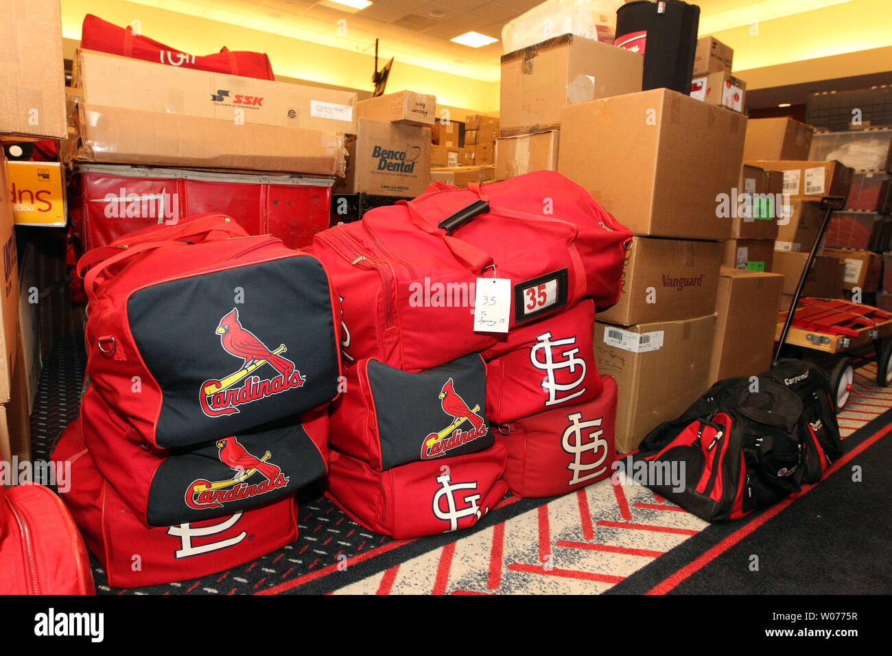 The St. Louis Cardinals locker room at Busch Stadium fis ull of boxes and  equiptment as movers in St. Louis begin to transfer everything to a waiting  truck as they prepare to