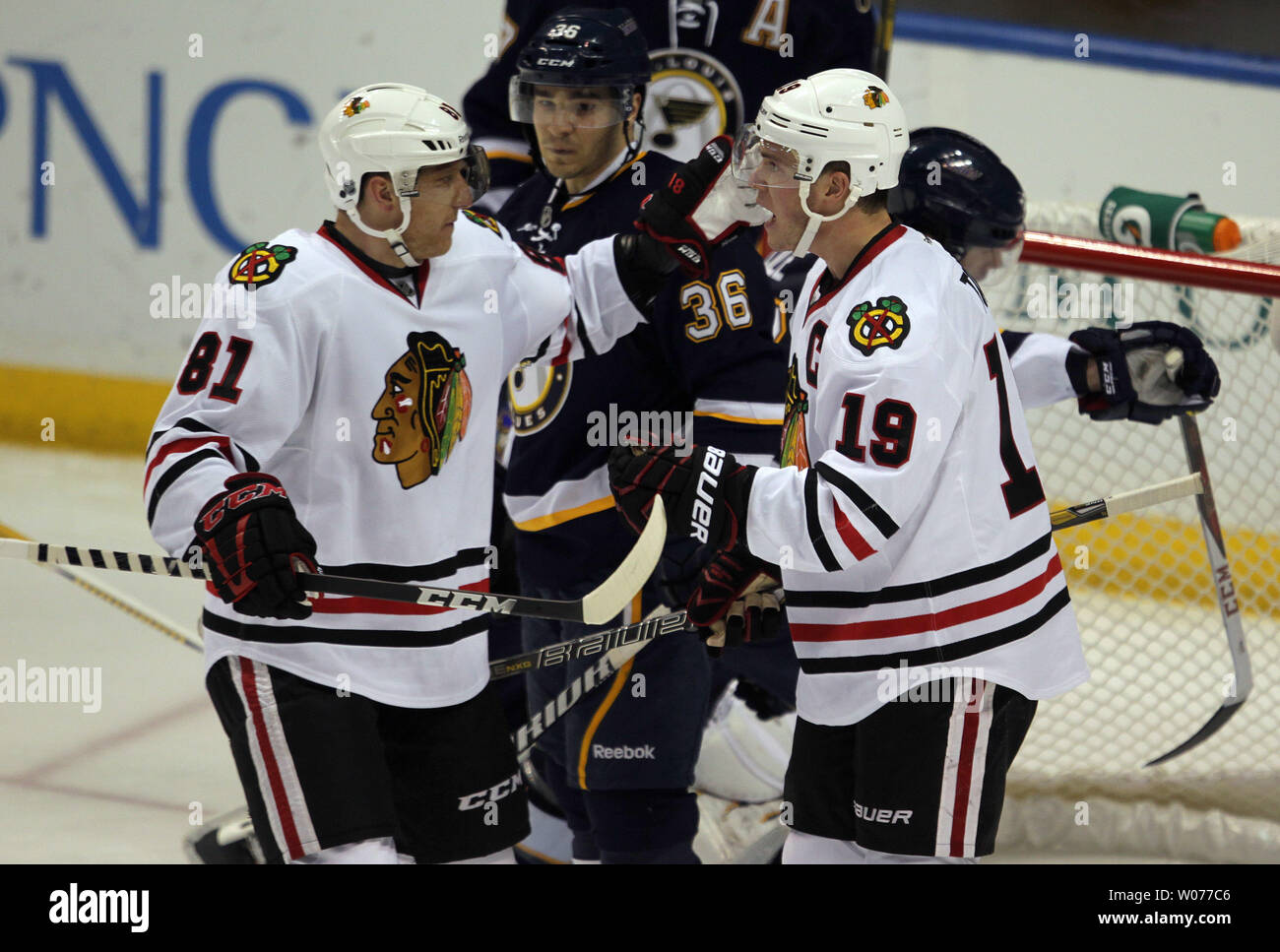 Chicago Blackhawks Jonathan Toews (R) celebrates his second goal of the game with teammate Marian Hossa of Slovakia in the third period at the Scottrade Center in St. Louis on February 28, 2013.  Chicago won the game 3-0. UPI/Bill Greenblatt Stock Photo