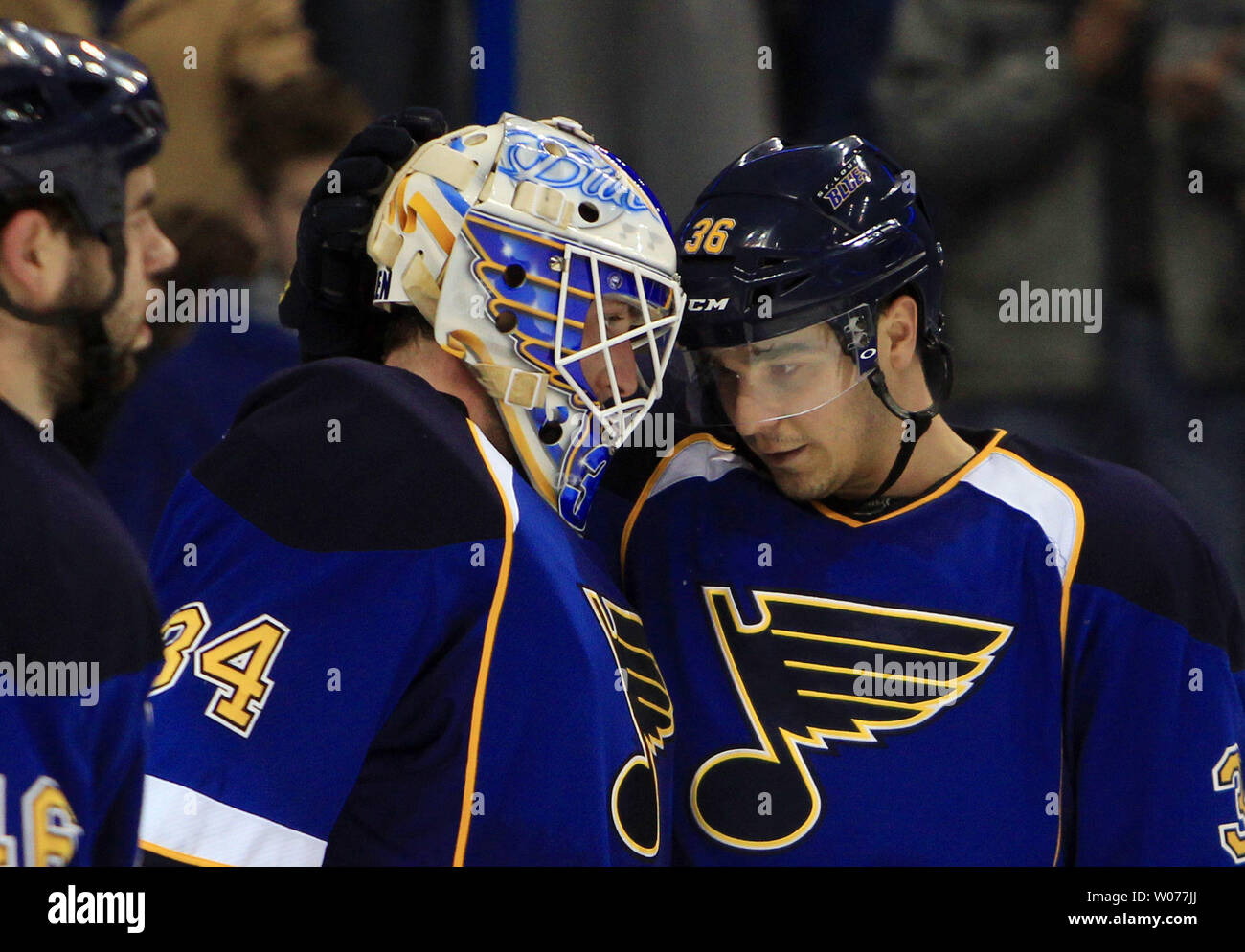 St. Louis Blues players line up to congratulate goaltender Ben Bishop after  the final horn against the Anaheim Ducks at the Scottrade Center in St.  Louis on February 19, 2011. St. Louis