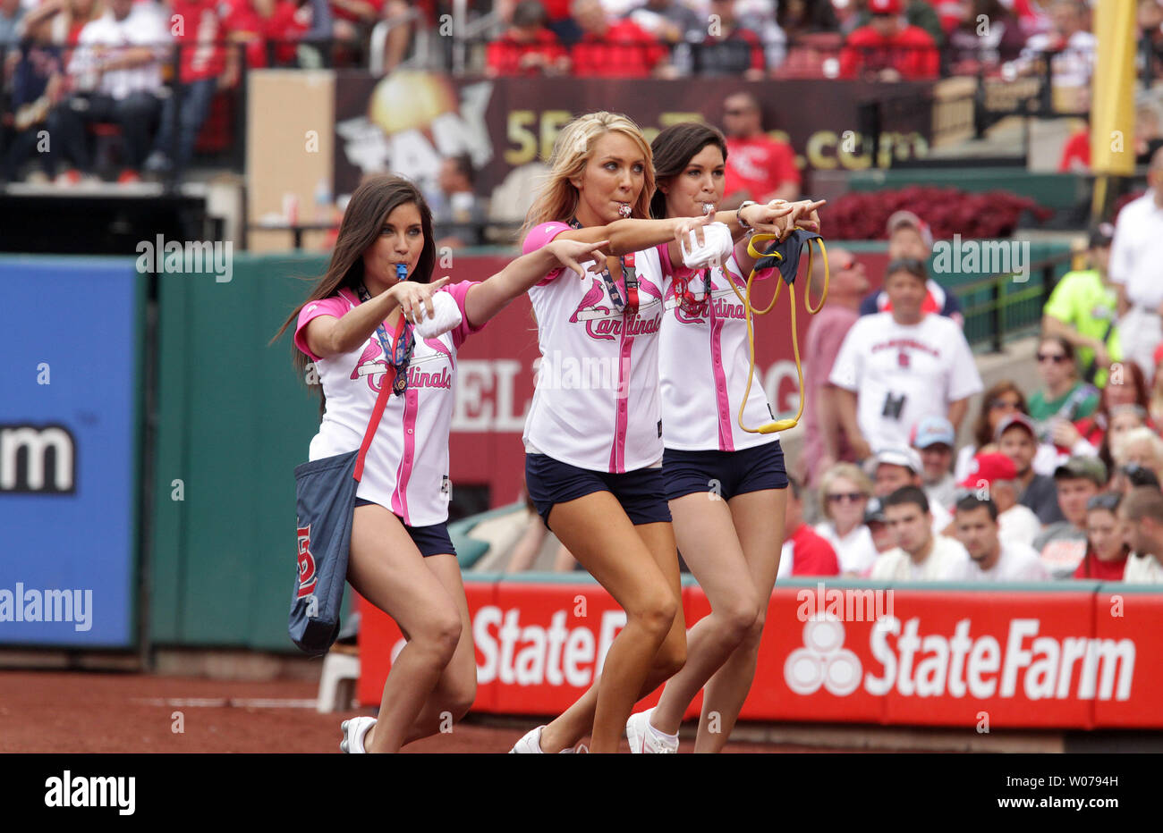St. Louis Cardinals Fredbird Girls try to stir up the crowd between innings  in a game between the San Francisco Giants and St. Louis Cardinals at Busch  Stadium in St. Louis on