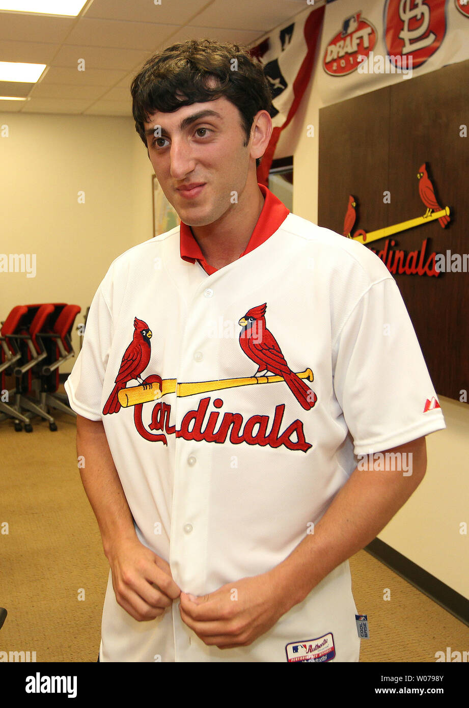 St. Louis Cardinals 1st round pick pitcher Rob Kaminsky tries on a