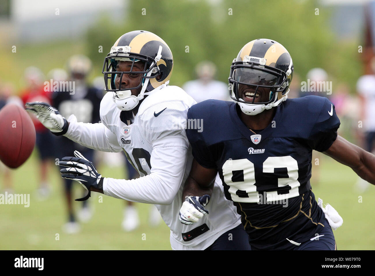 St. Louis Rams Brian Quick (R) battles Darian Stewart for a loose football during training camp at the team practice facility in Earth City , Missouri on July 29, 2013.   UPI/Bill Greenblatt Stock Photo