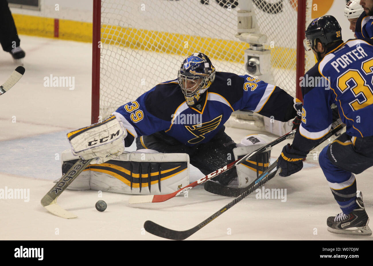 St. Louis Blues goaltender Ryan Miller controls a loose puck in front of his net during the first period against the Chicago Blackhawks in Game 2 of the Western Conference Playoffs at the Scottrade Center in St. Louis on April 19, 2014. UPI/Bill Greenblatt Stock Photo
