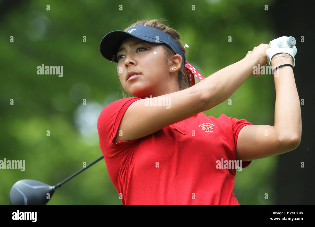 USA team member Alison Lee of Valencia, California takes her opening tee shot during the afternoon session of the 38th Curtis Cup match at St. Louis Country Club in Ladue, Missouri on June 6, 2014. The Curtis Cup Match is played by women amateur golfers, one team from the United States of America and one team representing England, Ireland, Northern Ireland,Scotland and Wales. The team consist of eight players and a captain     UPI/Bill Greenblatt Stock Photo