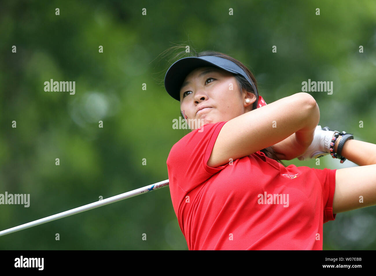 USA team member Erynne Lee of Silverdale, Washington  takes her opening tee shot during the afternoon session of the 38th Curtis Cup match at St. Louis Country Club in Ladue, Missouri on June 6, 2014. The Curtis Cup Match is played by women amateur golfers, one team from the United States of America and one team representing England, Ireland, Northern Ireland,Scotland and Wales. The team consist of eight players and a captain     UPI/Bill Greenblatt Stock Photo