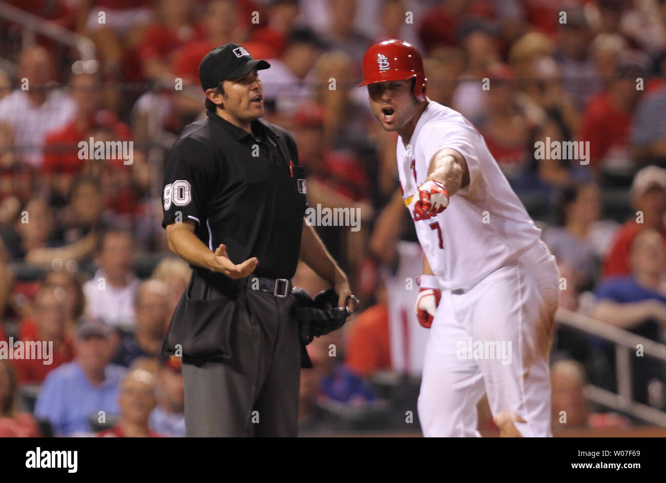 St. Louis Cardinals Matt Holliday argues a called third strike with ...