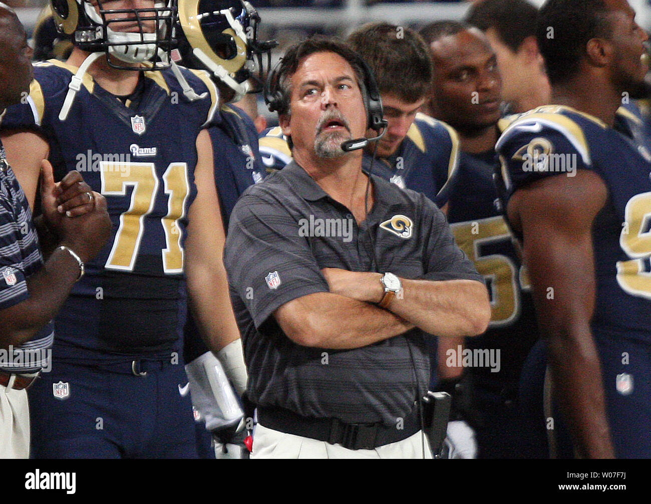 St. Louis Rams head football coach Jeff Fisher watches the video replay board during the first quarer against the New Orleans Saints at the Edward Jones Dome in St. Louis on August 8, 2014.  UPI/Bill Greenblatt Stock Photo