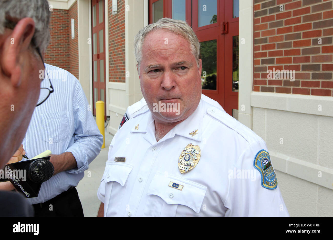 Ferguson Police Chief Thomas Jackson speaks to reporters following a demonstration in Ferguson, Missouri on August 11, 2014. People are upset because of the Ferguson Police shooting and death of an unarmed black teenager Michael Brown on August 9, 2014. In all about 20 businesses sustained damage after a candlelight vigil turned violent. UPI/Bill Greenblatt Stock Photo