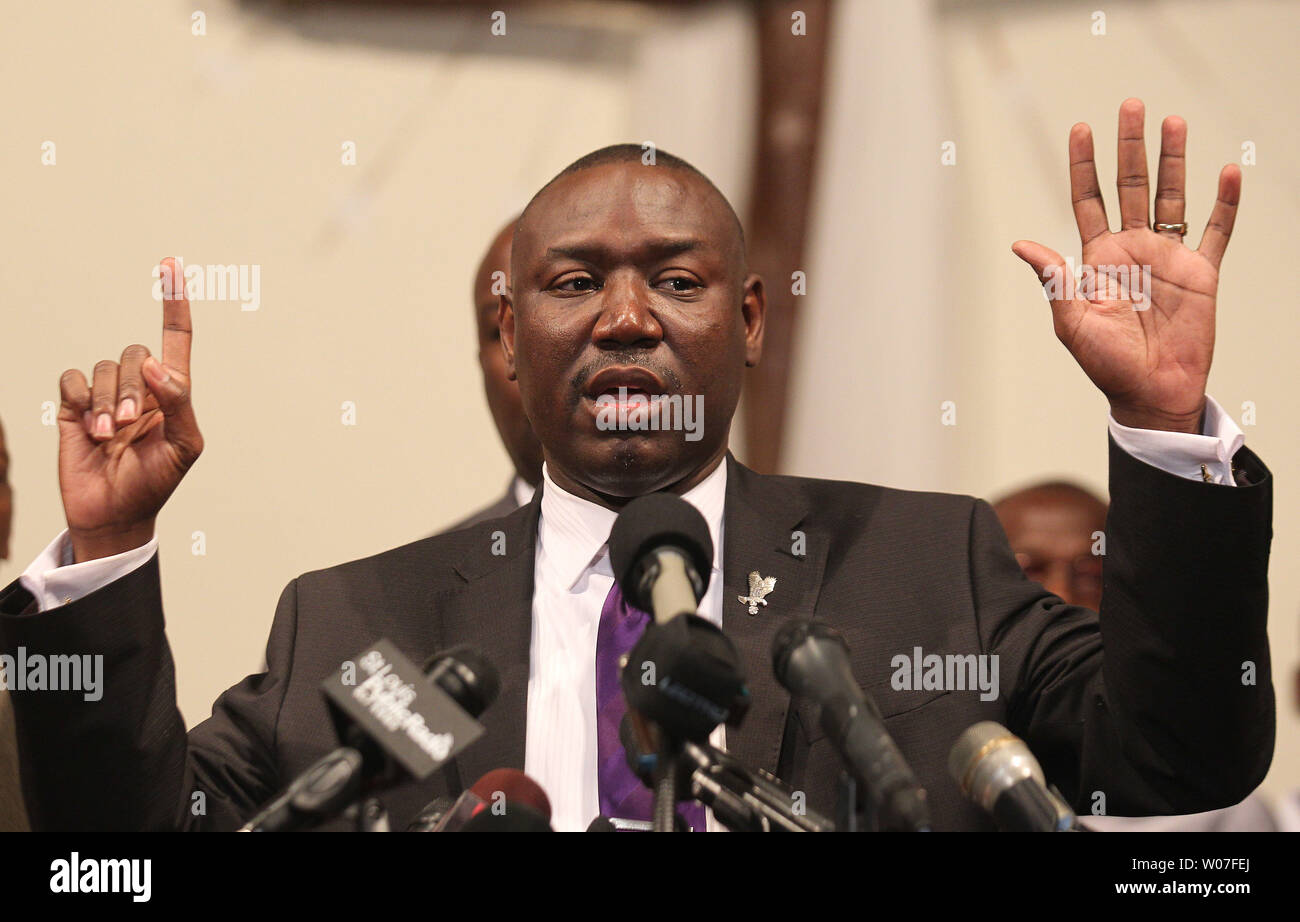Attorney Benjamin Crump indicates with his fingers that teen Michael Brown was shot six times, during a preliminary autopsy report in Ferguson, Missouri on August 18, 2014. Dr. Michael M. Baden, the former chief medical examiner for the City of New York, performed an autopsy at the request of the family of Brown. Baden reports that Brown was shot six times and the wound to the head was most likely the shot that killed Brown. Brown was shot by a St. Louis County officer after a struggle for the officers weapon and fight on August 9, 2014. UPI/Bill Greenblatt Stock Photo