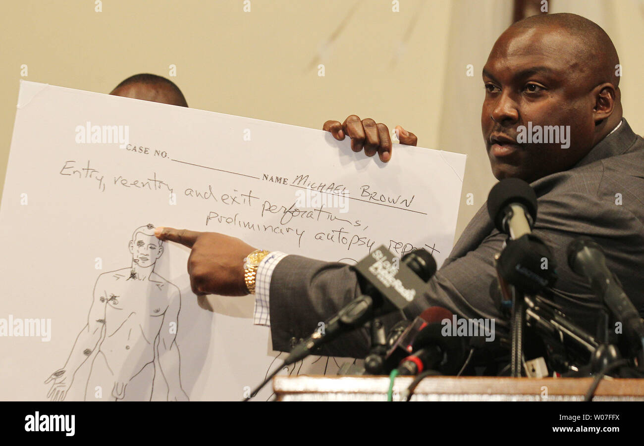 Family attorney Daryl Parks talks about a preliminary autopsy report on Michael Brown at a press conference in Ferguson, Missouri on August 18, 2014.  Brown was shot six times and the wounds to the head was most likely the shot that killed Brown. Brown was shot by a St. Louis County officer after a struggle for the officers weapon and fight on August 9, 2014. UPI/Bill Greenblatt Stock Photo
