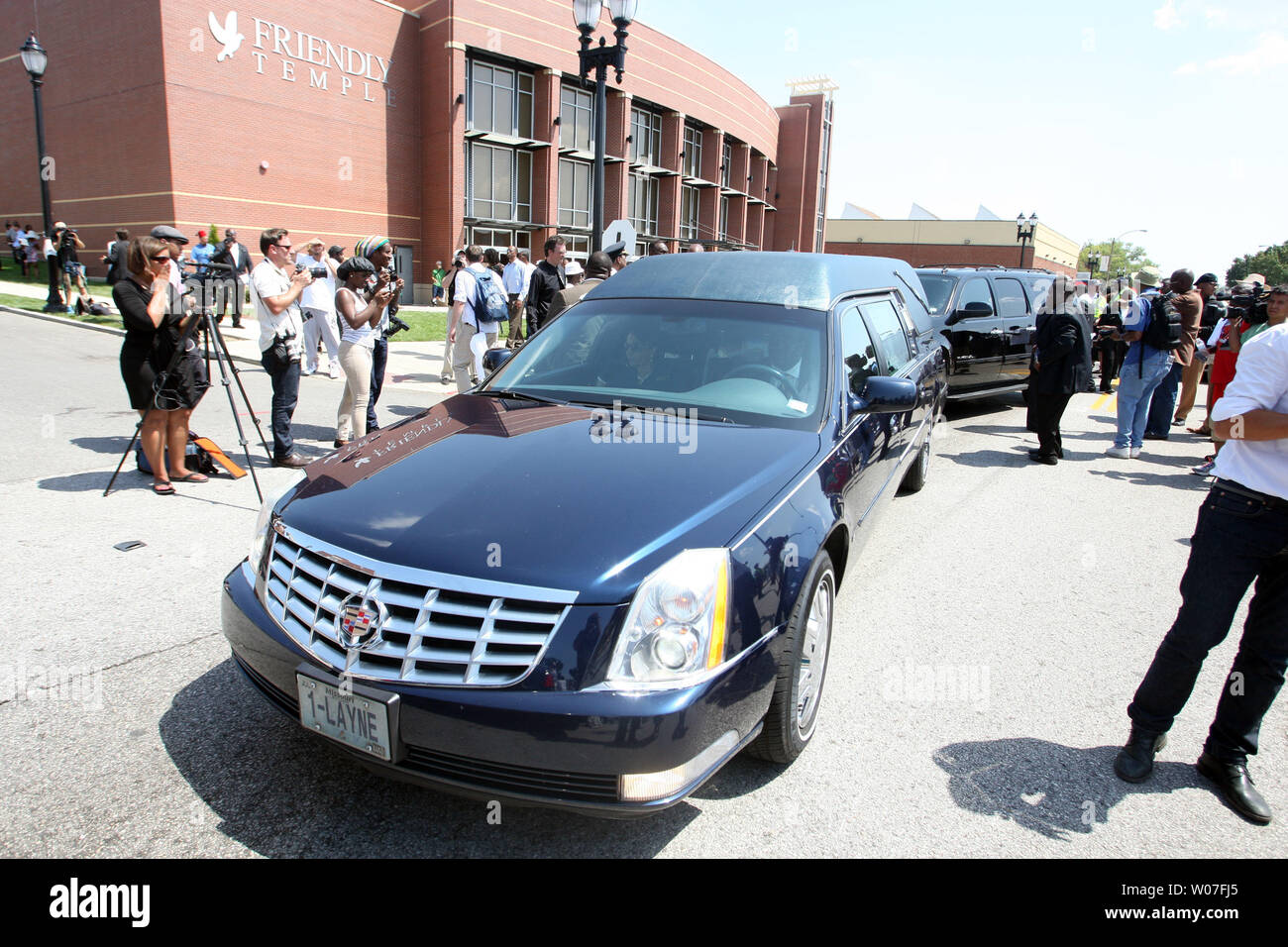 The hearse containing the remains of Michael Brown Jr. leaves the Friendly Temple Missionary Baptist Church at the completion of his funeral in St. Louis on August 25, 2014. Brown gained attention after was shot by a white Ferguson, Missouri police officer on August 9 and was unarmed. The shooting led to several nights of looting, arrests and heavy police presence.   UPI/Bill Greenblatt Stock Photo