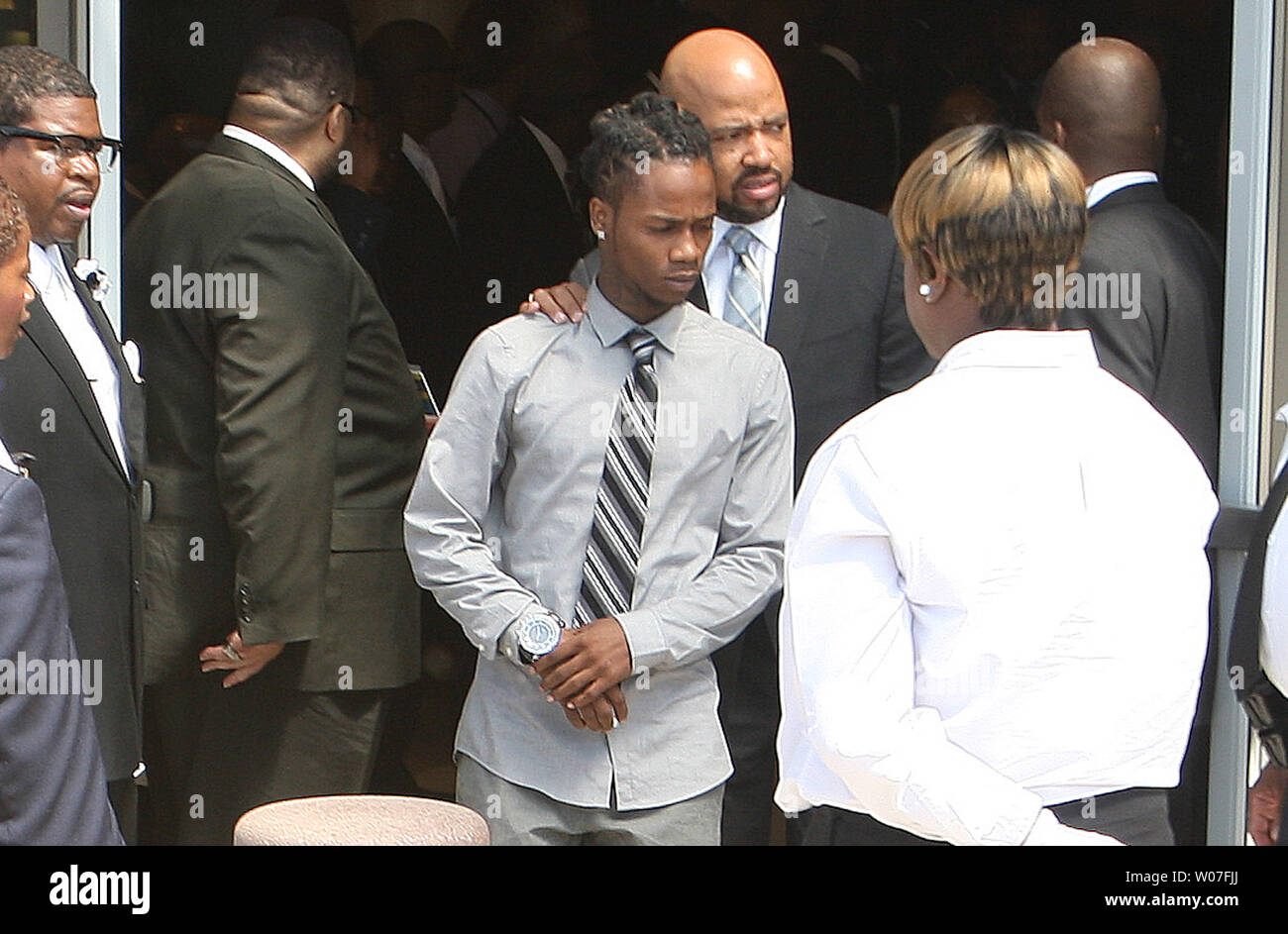 Dorian Johnson, 22, leaves the funeral of friend Michael Brown at the Friendly Temple Missionary Baptist Church in St. Louis on August 25, 2014. Johnson was with Brown when he was shot by a white Ferguson, Missouri police officer on August 9. The shooting led to several nights of looting, arrests and heavy police presence.   UPI/Bill Greenblatt Stock Photo