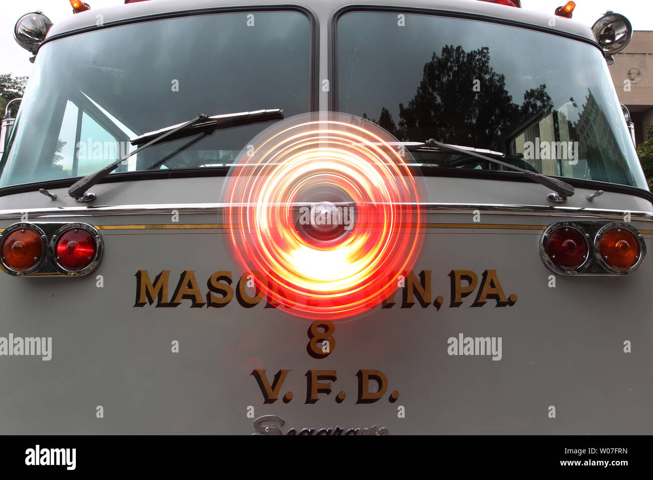 A fire truck displays its Roto Ray circular emergency light on its