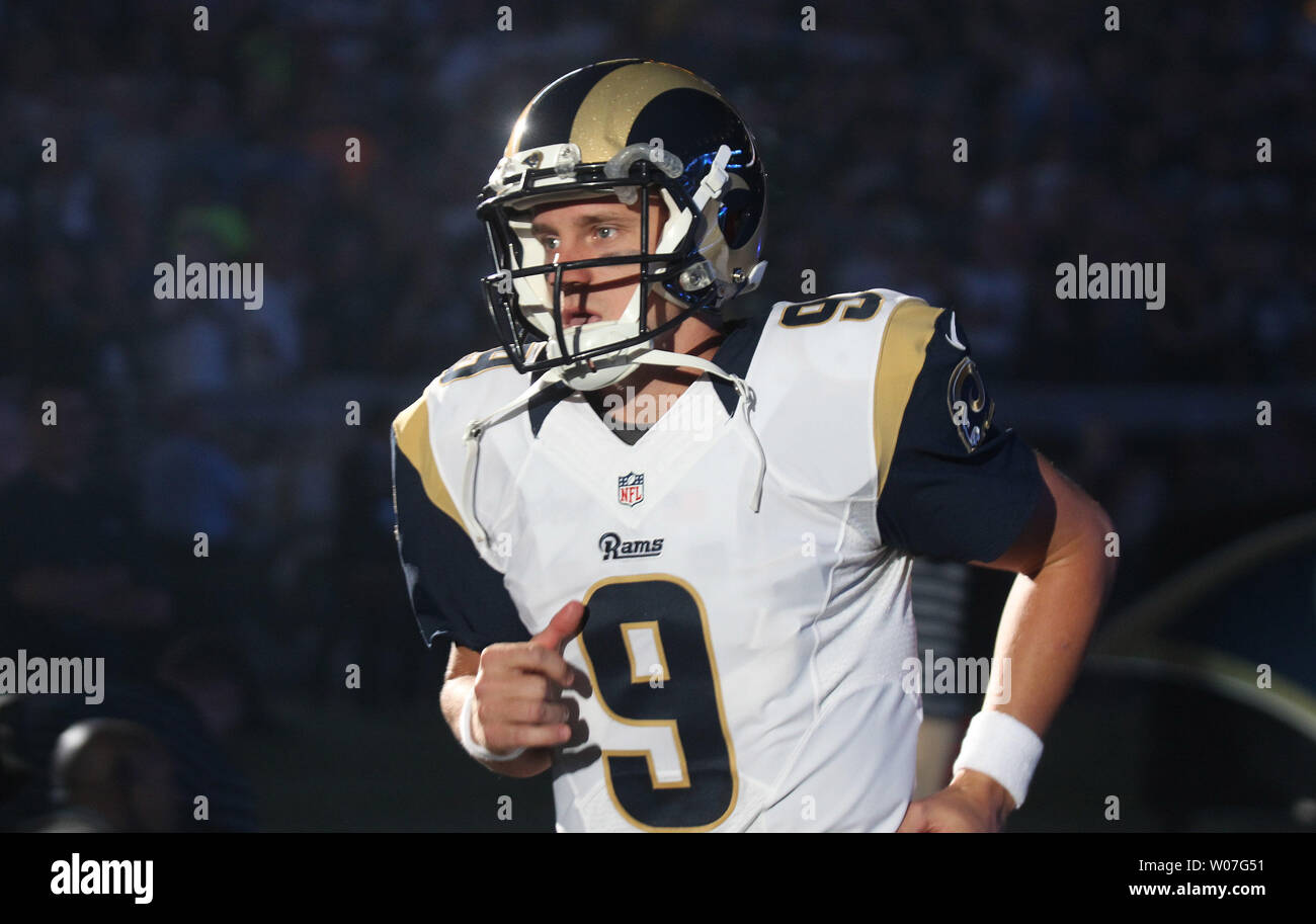 St. Louis Rams quarterback Austin Davis runs onto the field during ...