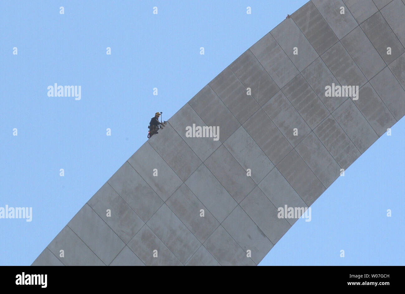 A Worker With An Engineering Team Rappels Down The North Leg Of The Gateway Arch To Collect