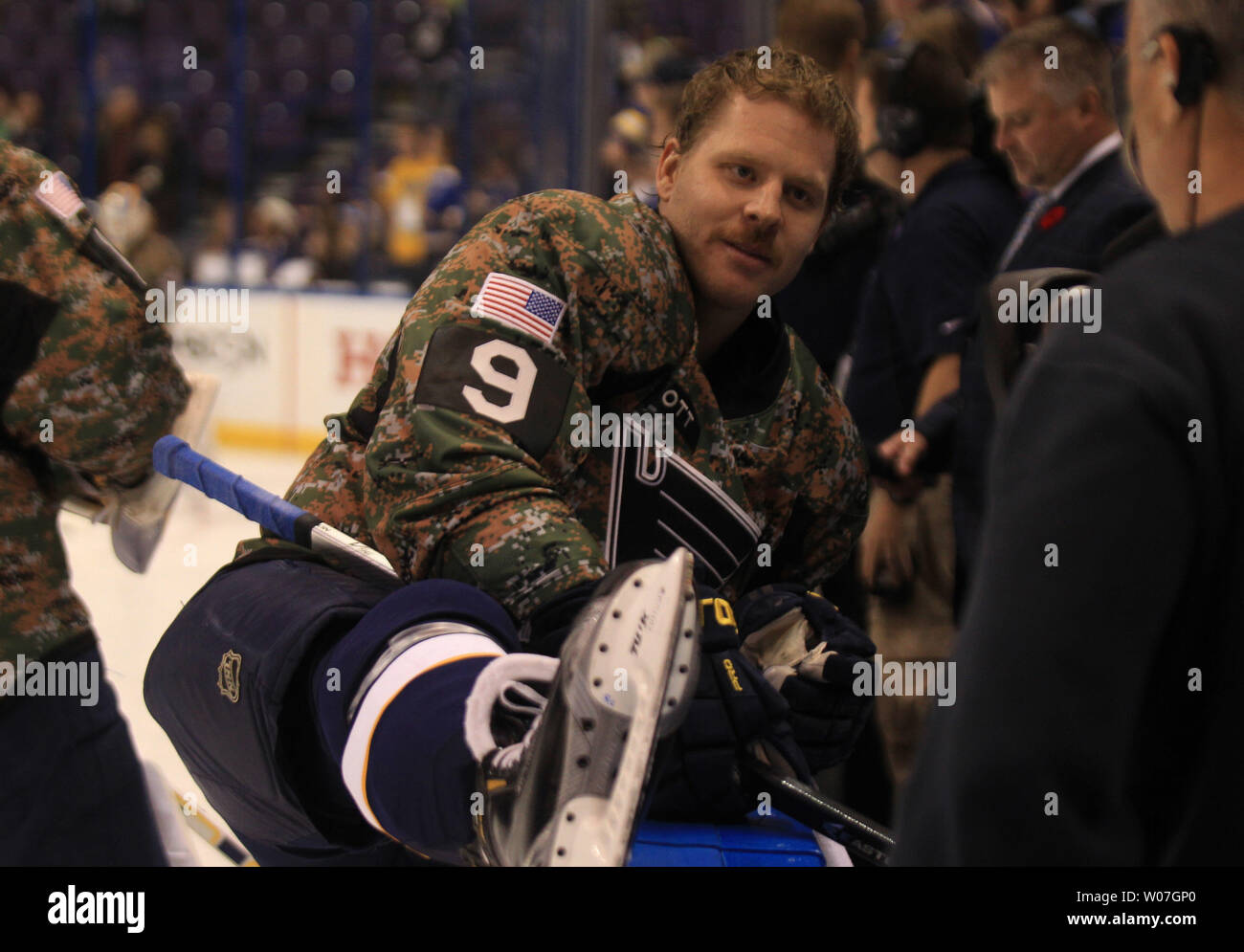 St. Louis Blues Steve Ott stretches wearing a camouflage jersey during a  pre game skate before a game against the Buffalo Sabres at the Scottrade  Center in St. Louis on November 11,