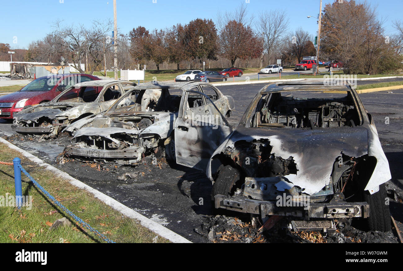Shells of cars is all that remains after they were destroyed by fire during a night of turmoil in Ferguson, Missouri on November 25, 2014. After the verdict was read in the Michael Brown shooting case looting, riots and fires broke out in the area.   UPI/Bill Greenblatt Stock Photo