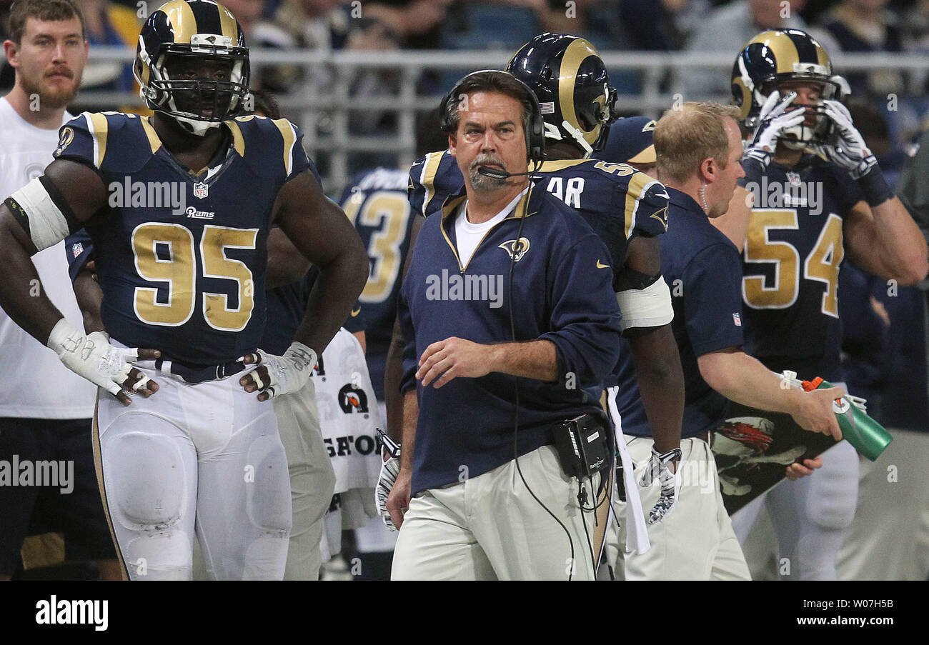 St. Louis Rams head football coach Jeff Fisher watches the action against  the Oakland Raiders in the first quarter at the Edward Jones Dome in St.  Louis on November 30, 2014. St.