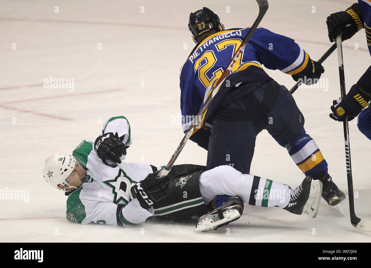 St. Louis Blues Alex Pietrangelo takes down Dallas Stars Ryan Garbutt in the first period at the Scottrade Center in St. Louis on February 17, 2015. Photo by BIll Greenblatt/UPI Stock Photo