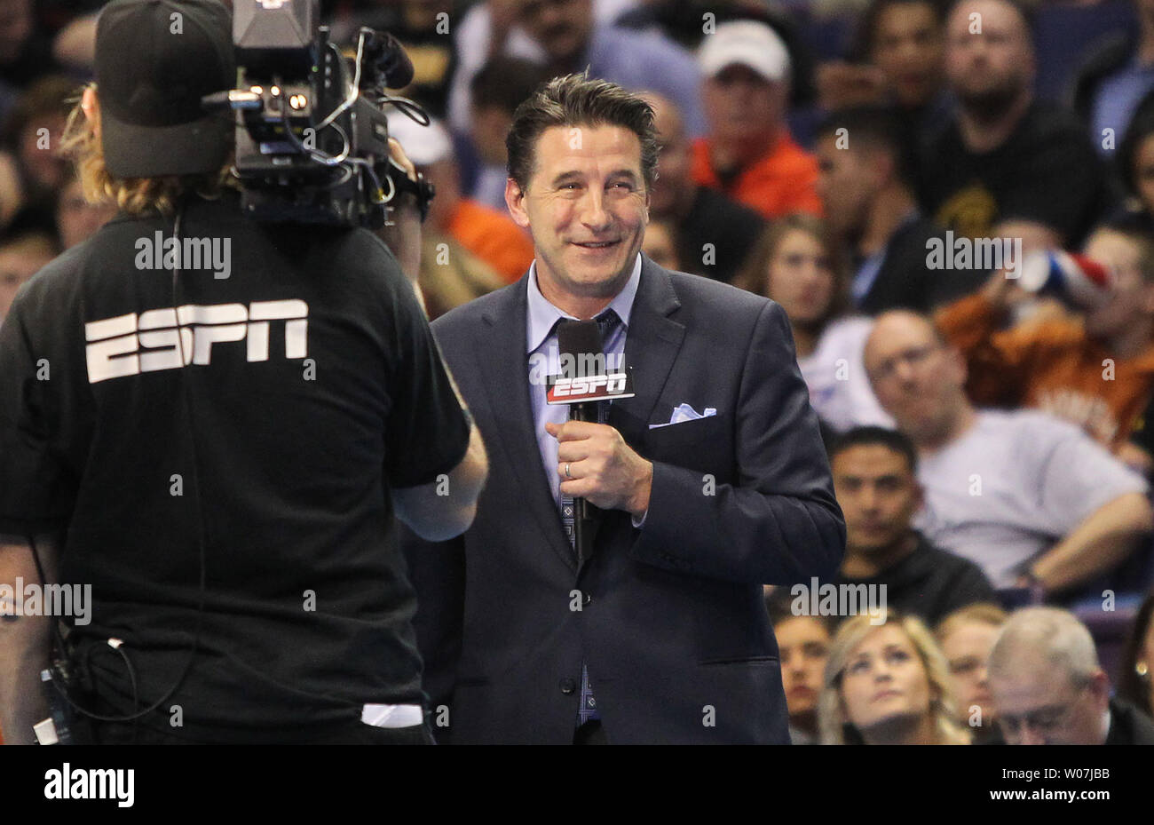 Actor Billy Baldwin likes what he sees on the mat as he reports for