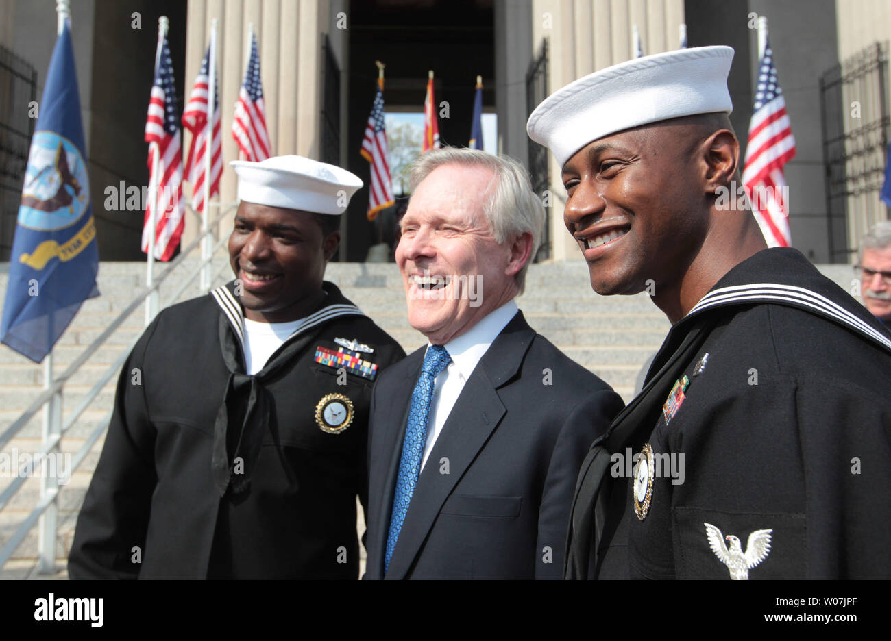 Secretary of the Navy Ray Mabus takes photos with sailors after a ...