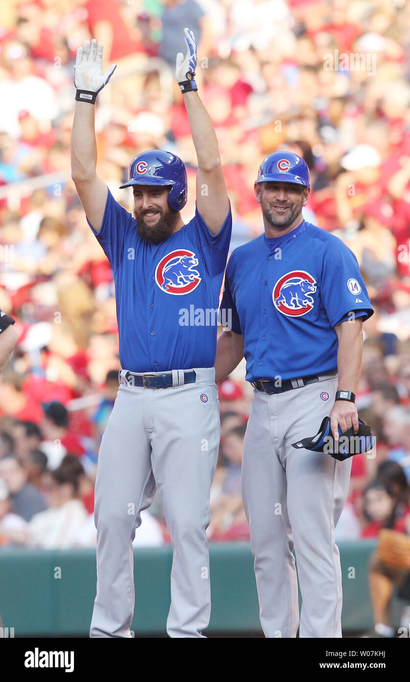 Chicago Cubs starting pitcher Donn Roach celebrates a single with first