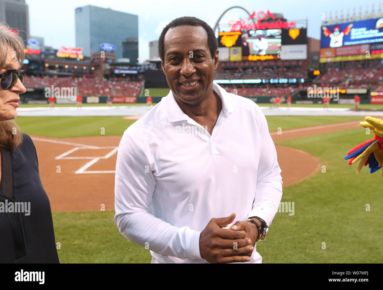Former St. Louis Cardinals outfielder Tito Landrum smiles as he prepares to throw a ceremonial first pitch before the San Francisco Giants- St. Louis Cardinals baseball game at Busch Stadium in St. Louis on August 18, 2015. Landrum was a member of the Cardinals during the 1980's.    Photo by Bill Greenblatt/UPI Stock Photo