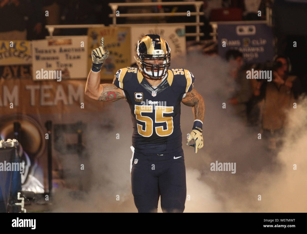 St. Louis Rams James Laurinaitis pumps up the crowd as he runs onto the ...