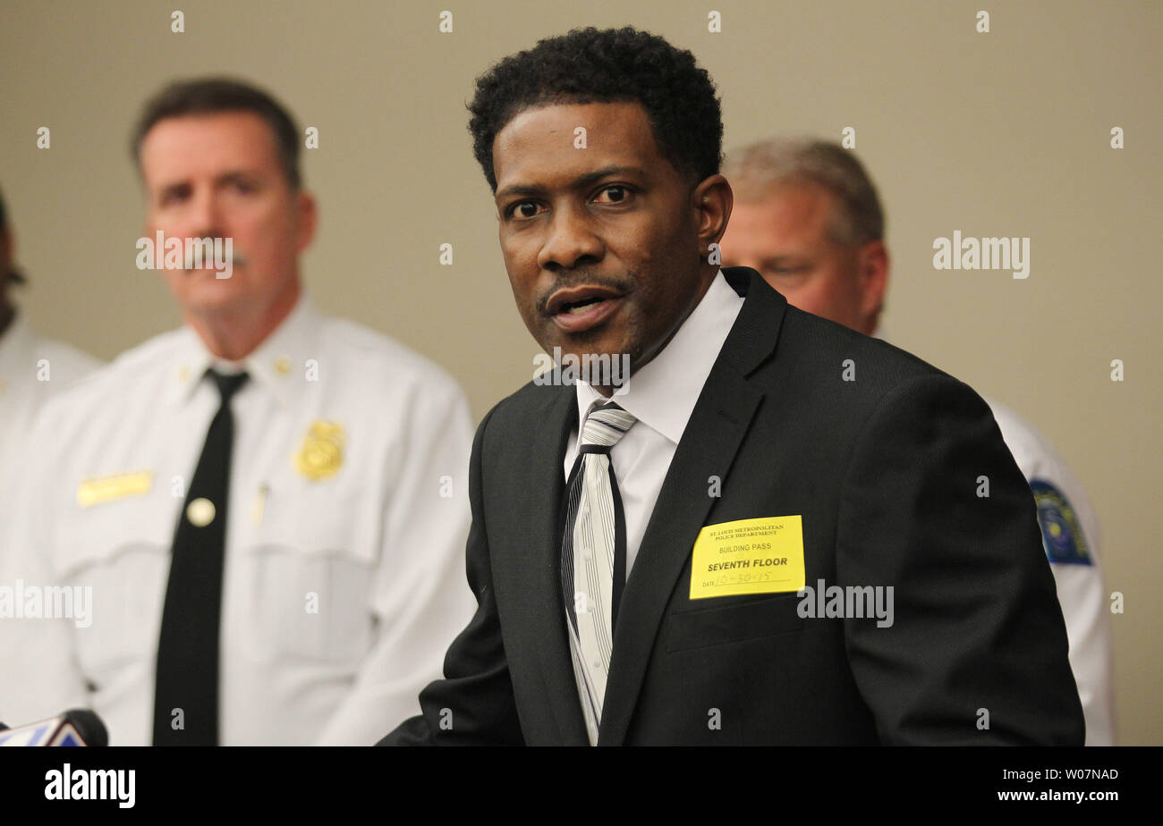 Pastor David Triggs of the New Life Missionary Baptist Church talks about the arrest of a suspect who set fire to his church on October 17, 2015, as St. Louis Fire Chief Dennis Jenkerson (L) look on, during a press conference in St. Louis on October 30, 2015. St. Louis Police say thay have arrested David Lopez Jackson for setting two of the seven suspious fires at St. Louis are churches. Based on the investigation so far, police say there is no indication of a hate crime or sign of any particular Christian denomination or ethnic group being targeted. Photo by Bill Greenblatt/UPI Stock Photo