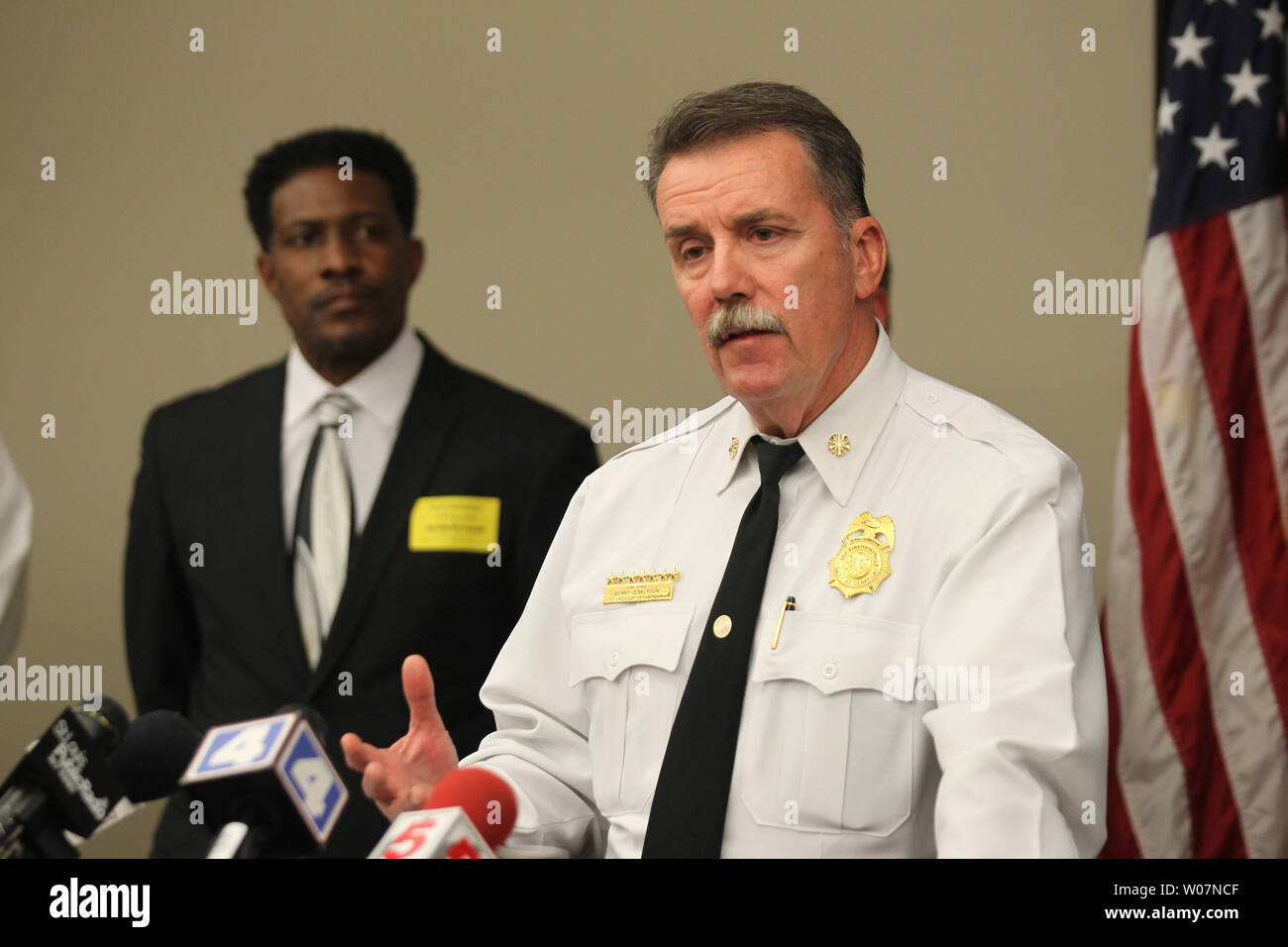 St. Louis Fire Chief Dennis Jenkerson comments on the arrest of a suspect who set fire to two churches in St. Louis on October 30, 2015. St. Louis Police say thay have arrested David Lopez Jackson for setting two of the seven suspious fires at St. Louis are churches. Based on the investigation so far, police say there is no indication of a hate crime or sign of any particular Christian denomination or ethnic group being targeted. Pastor David Triggs of the New Life Missionary Baptist Church, whose church sustained major damage, stands near. Photo by Bill Greenblatt/UPI Stock Photo