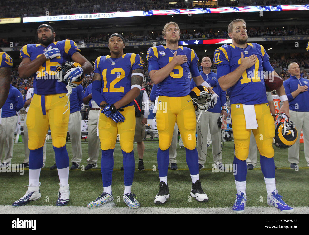 St. Louis Rams (L to R) Cory Harkey, Stedman Bailey, Nick Foles and Case Keenum stand for the National Anthem before a game against the San Francisco 49ers at the Edward Jones Dome in St. Louis on November 1, 2015.   Photo by Bill Greenblatt/UPI Stock Photo