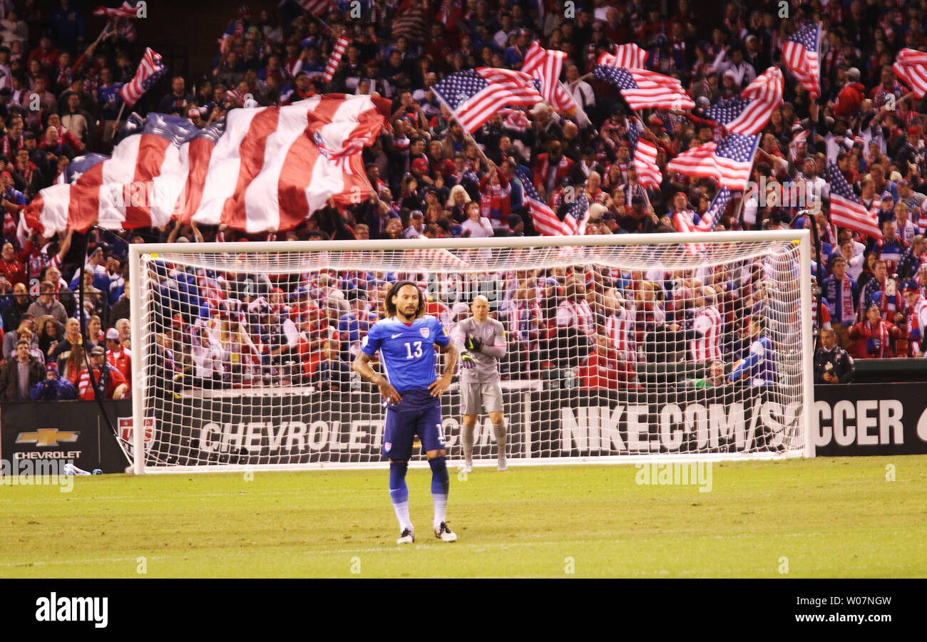 U.S.A.'s Jermaine Jones waits for play to restart as fans wave flags in the first half against St. Vincent and the Grenadines at Busch Stadium in St. Louis on November 13, 2015. USA won the game 6-1.   Photo by Bill Greenblatt/UPI Stock Photo
