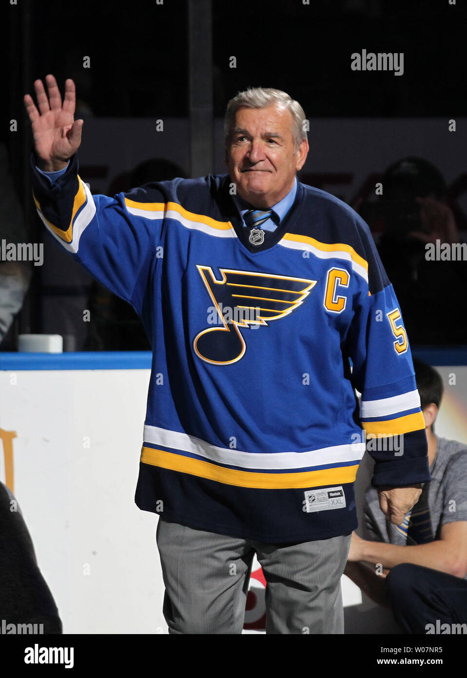 Former St. Louis Blues Captain Bob Plager waves to the crowd as he