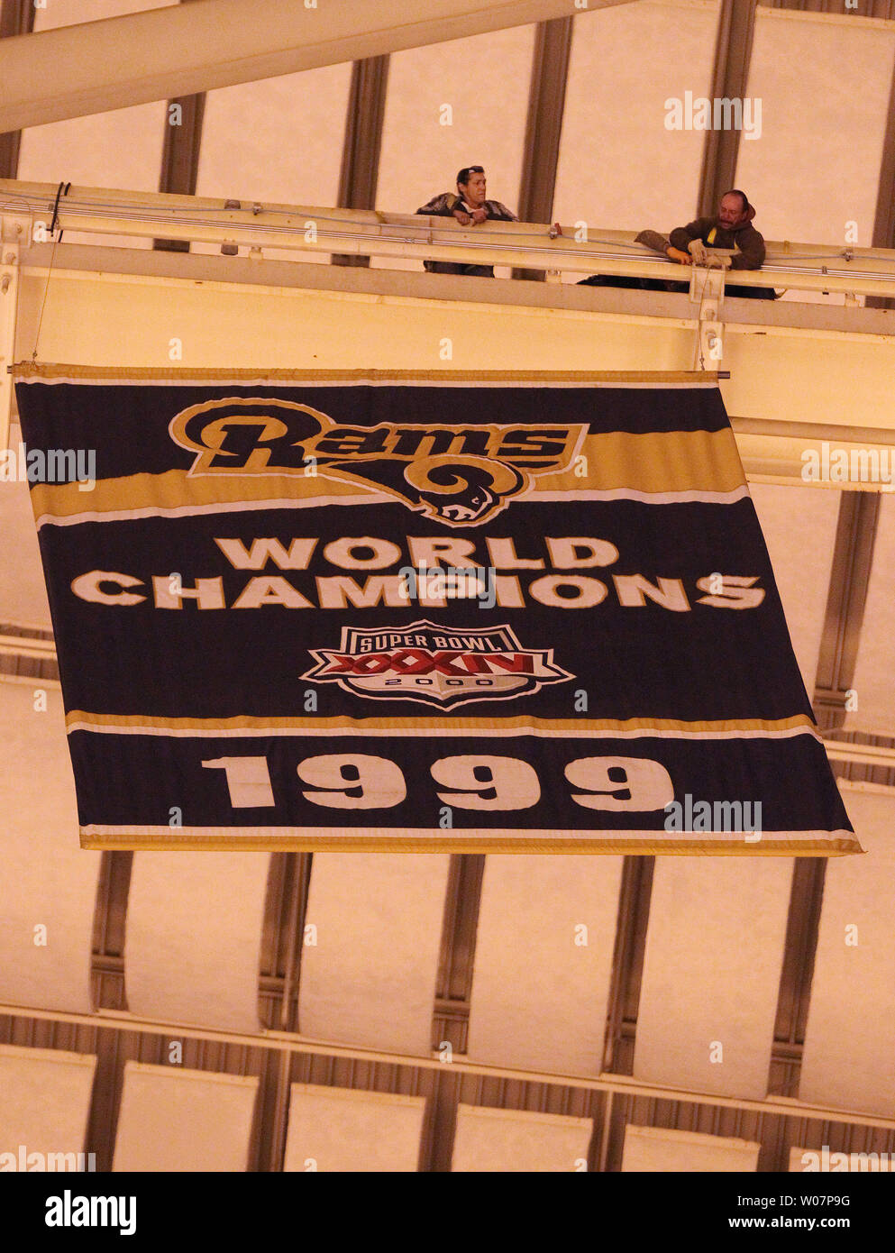 Decorators Begin To Lower The St Louis Rams Super Bowl Banner