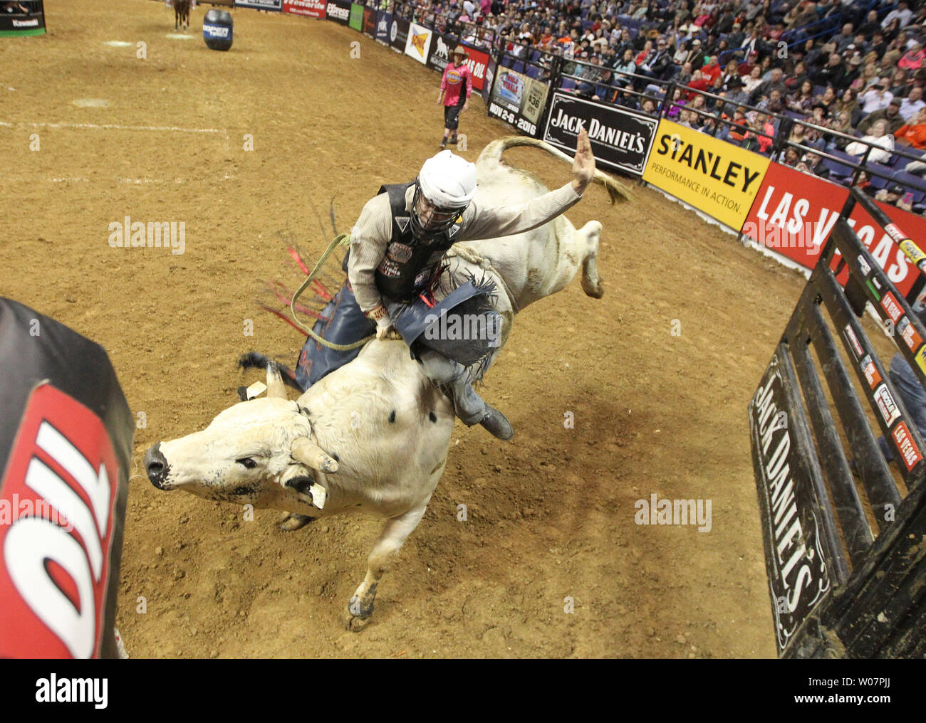 Bull rider Lachlan Richardson of Gresford, Australia holds onto Im ...