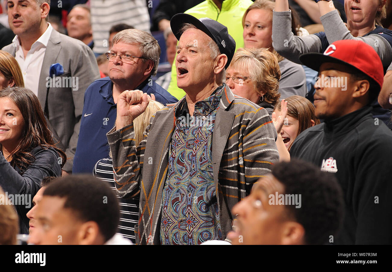 Actor Bill Murray cheers on Xavier from behind their bench as they play Wisconsin in the NCAA Division 1 Men's Basketball Championship at the Scottrade Center in St. Louis on March 20, 2016. Murray's son Luke is an assistant coach with the team. Wisconsin defeated Xavier, 66-63.    Photo by Doug Devoe/UPI Stock Photo
