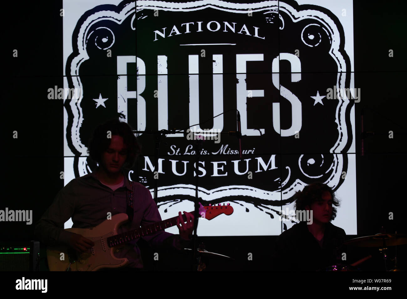 Musicians from the band Phi play as the opening band on the first day