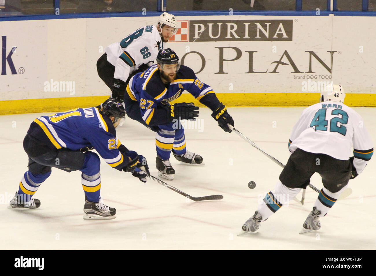 St. Louis Blues Alex Pietrangelo knocks the puck from the stick of San Jose Sharks Joel Ward in the first period at the Scottrade Center in St. Louis on May 23, 2016. UPI/Robert Cornforth Stock Photo