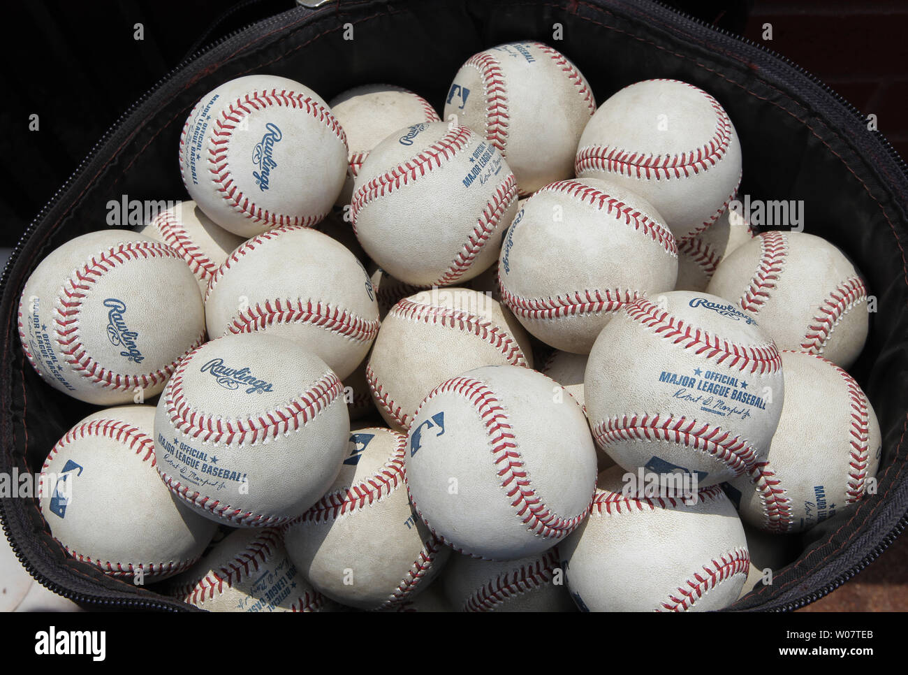Rubbed up baseballs wait to be used for the Texas RangersSt. Louis